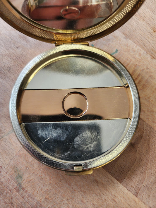 Amber pocket compact