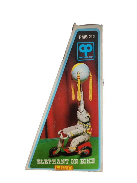 Elephant On Bike Wind-Up Tin Toy