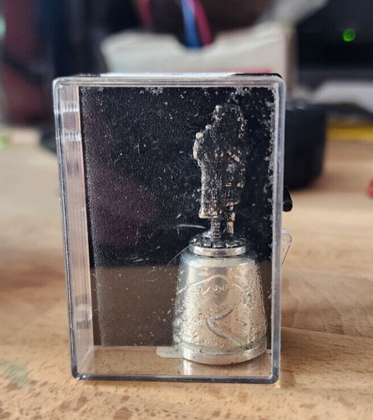 Silver Thimble Made in Scotland by Northern Studios Man Holding Pipe Bags