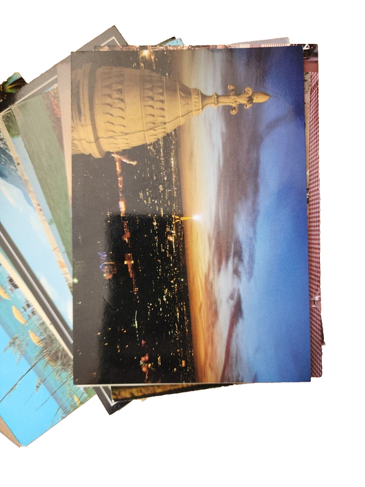 Collection of 16 different unposted postcards from across the word