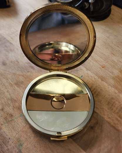 Amber pocket compact