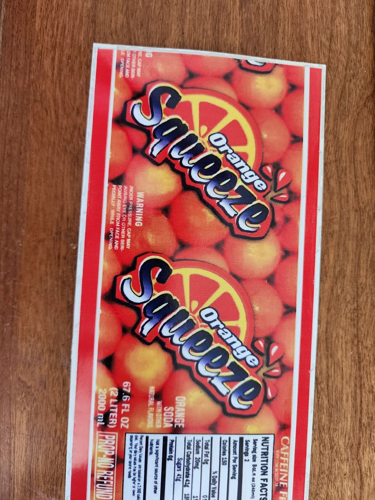 12 Fl Oz Orange Squeeze Soda Sticker Prop
