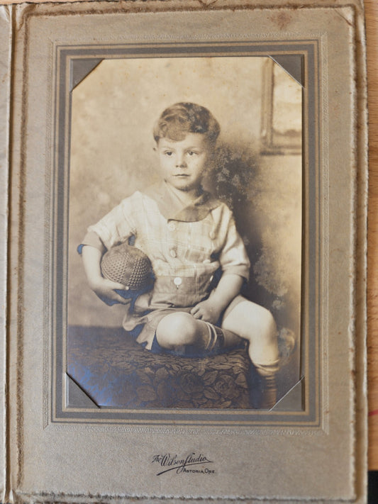 Vintage Boy with ball Wilson Studio Astoria Ore.