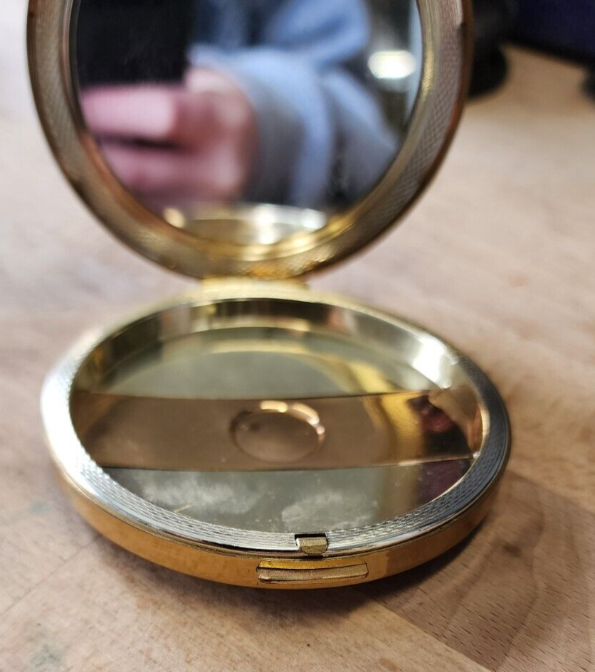 Amber pocket compact