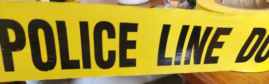 "POLICE LINE DO NOT CROSS" Tape