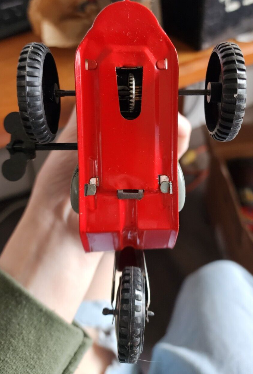 Elephant On Bike Wind-Up Tin Toy
