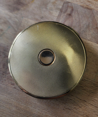 Amber pocket compact