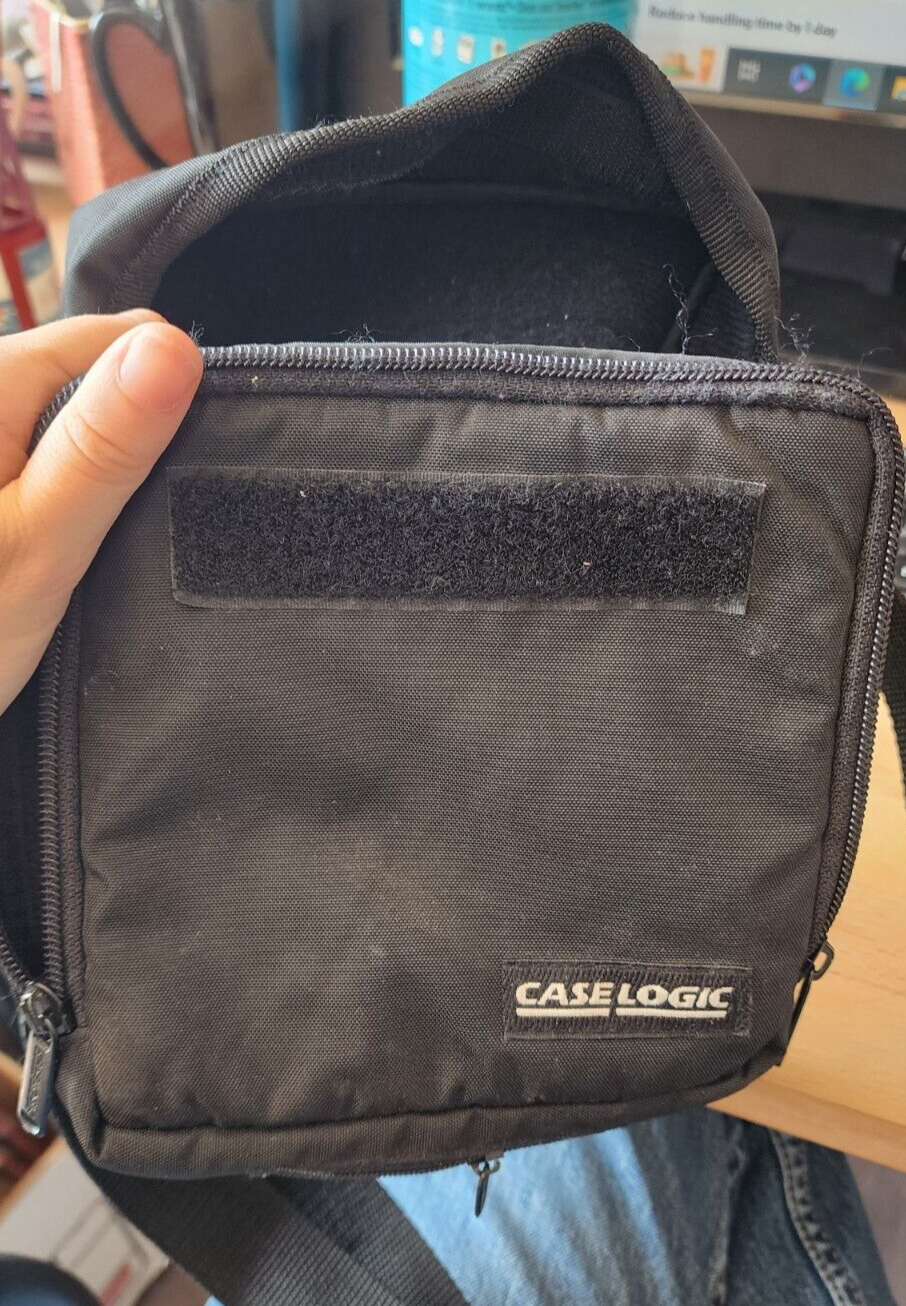 Case Logic CD DVD Holder Travel Storage Black w/straps Great Condition